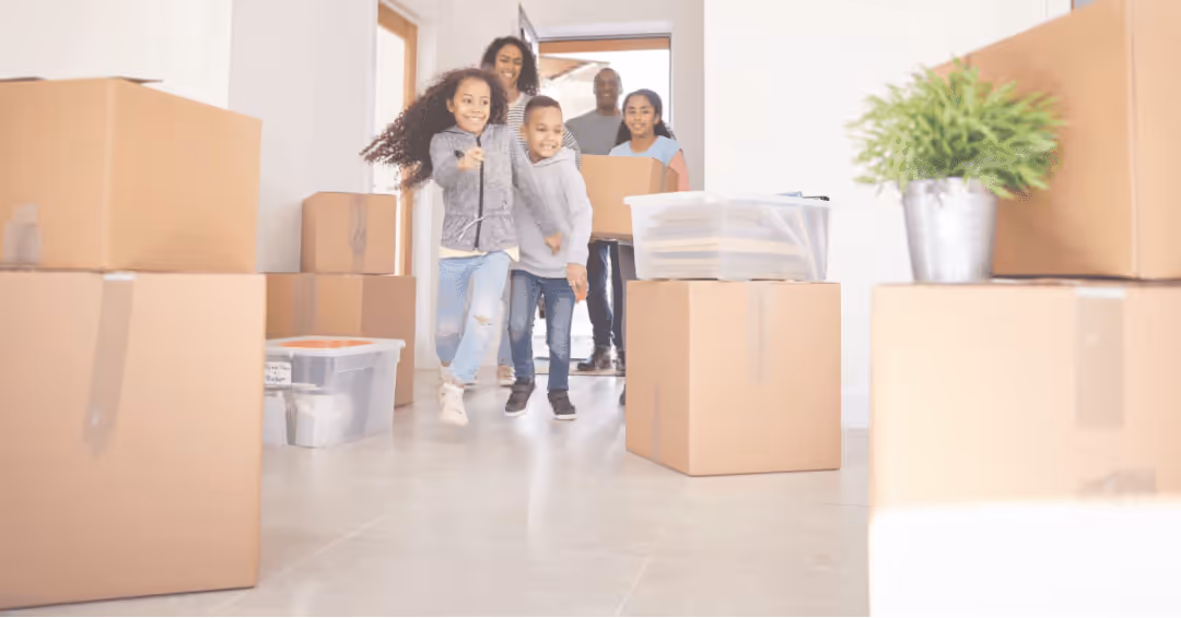 A joyful family holding keys to their new home, excited to move in, with financing smoothly handled by Pragmatic Mortgage Lending